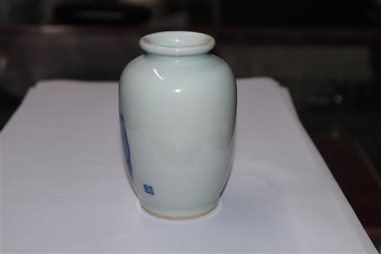 A Chinese small blue and white vase painted with a luohan H.10cm